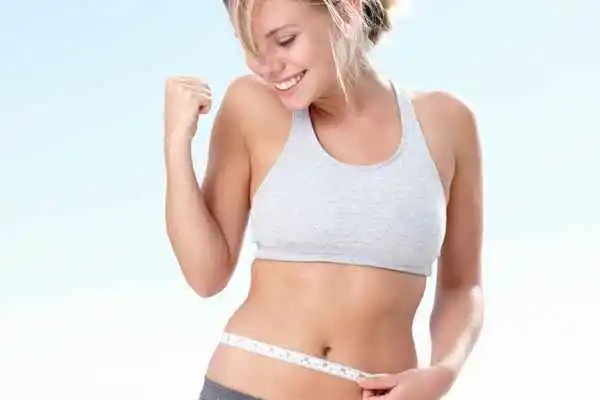 woman happy after fat reduction treatment Grimsby