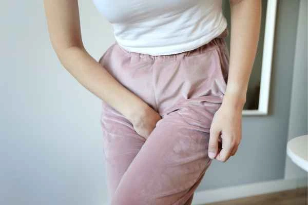 older woman running to the toilet because of urinary incontinence Grimsby
